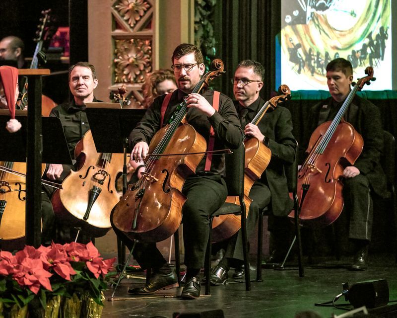 Men playing the cello