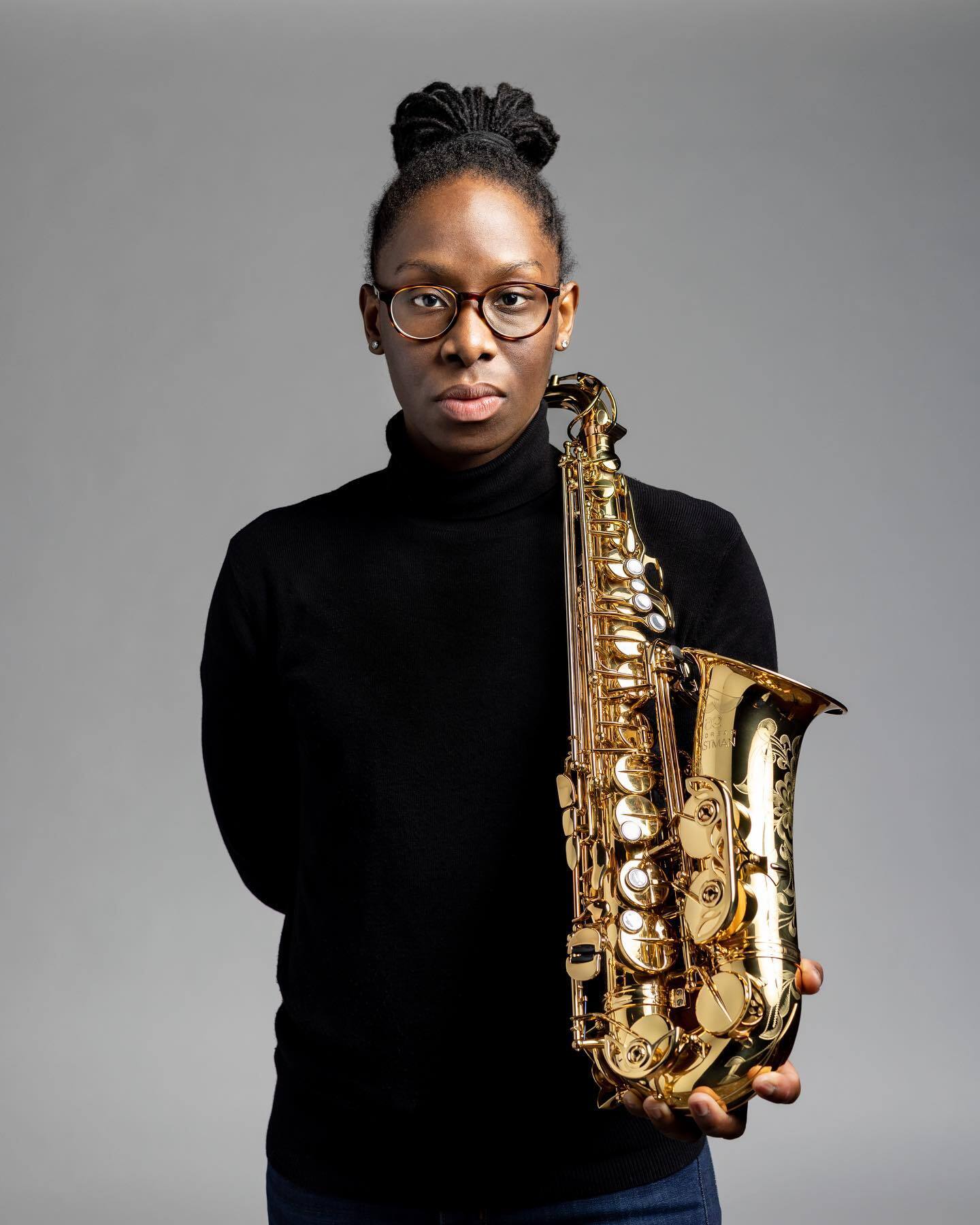 Portrait of Kendra Wheeler holding a saxophone